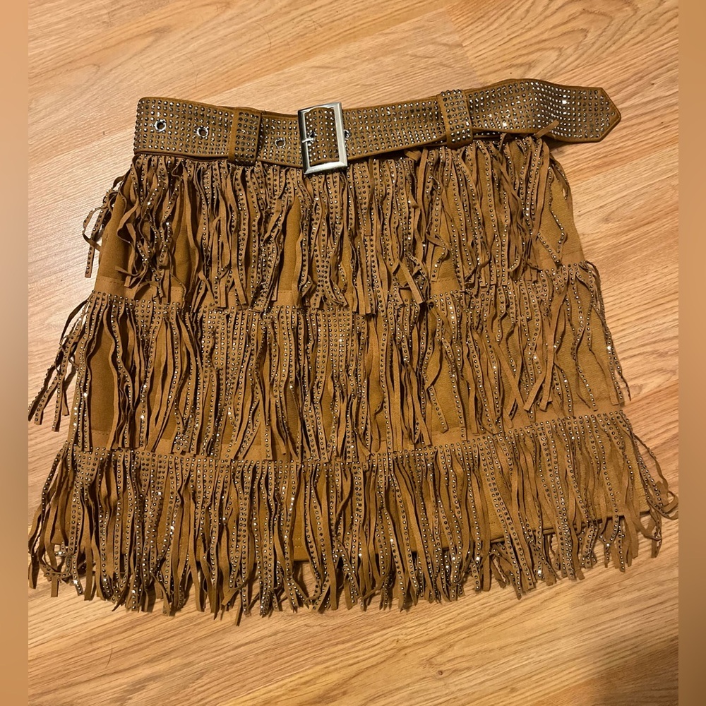Brown (camel) colored skirt with silver sparkles in the fringe. Size medium